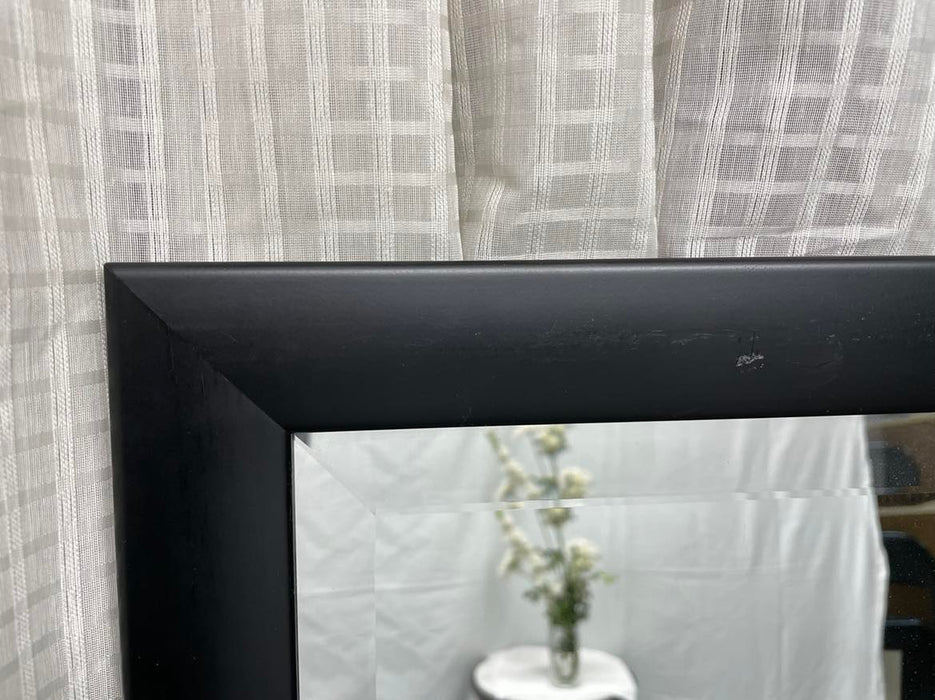 Beveled mirror with black frame