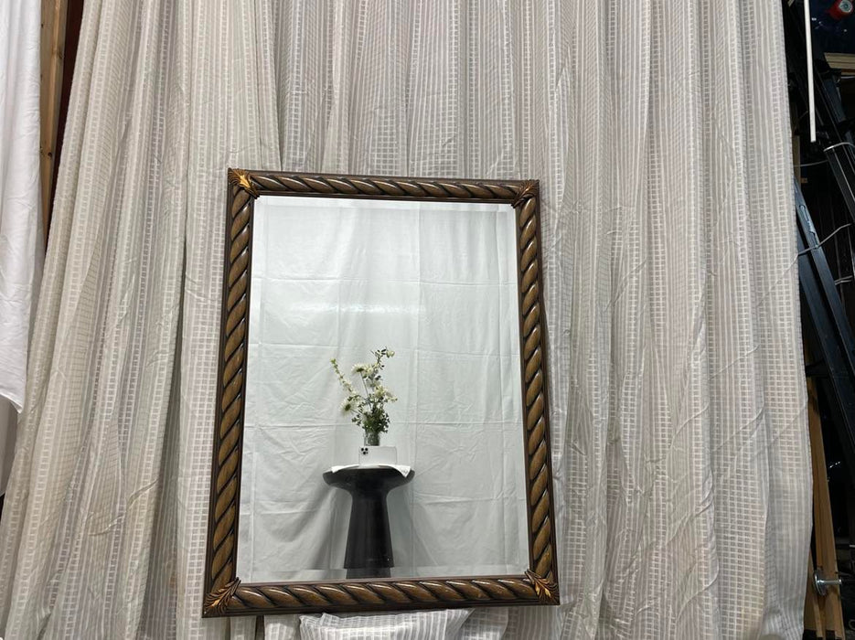 Spiral look framed mirror