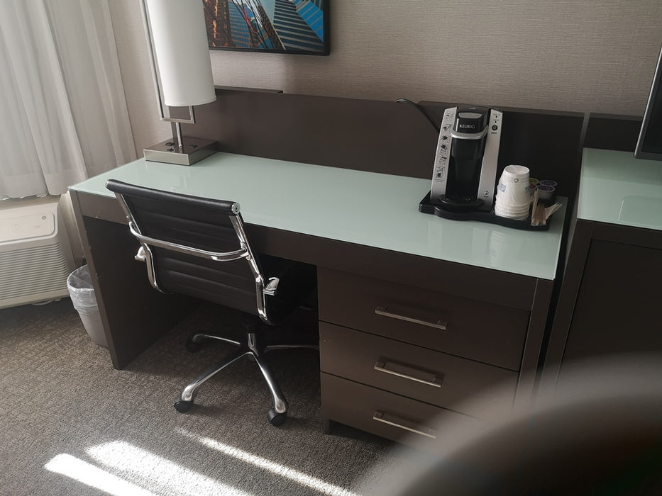 Solid desk with side drawers and glass top
