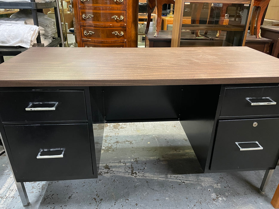 Black metal desk with four drawers