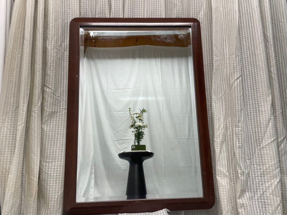 Beveled mirror with wood frame