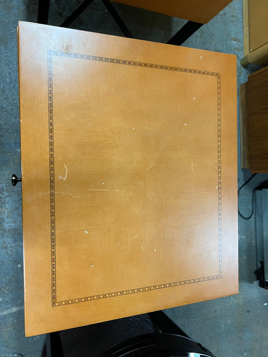 Honey color bedside table with iron legs