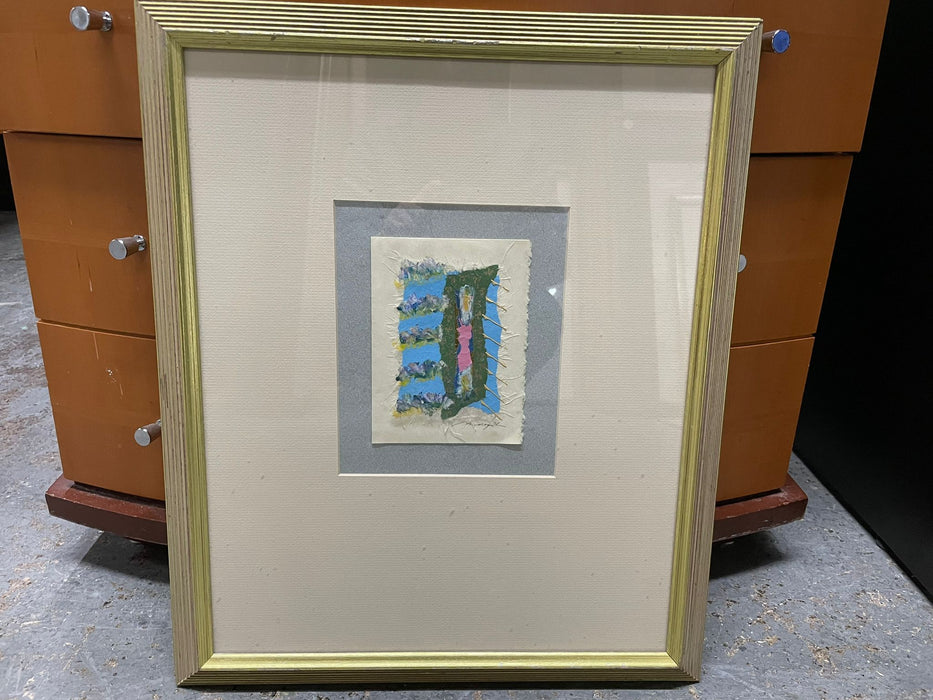 Abstract art with gold ribbed frame