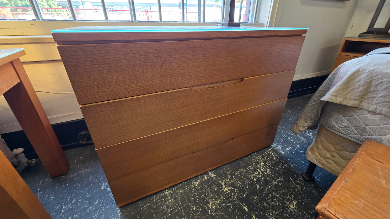 Honey Colored Four Drawer Dresser