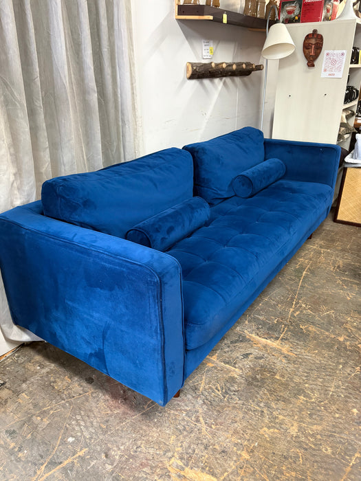 Blue velvet sofa