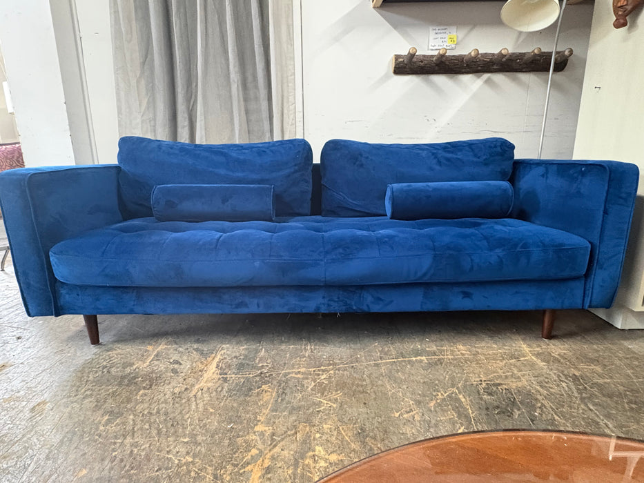 Blue velvet sofa