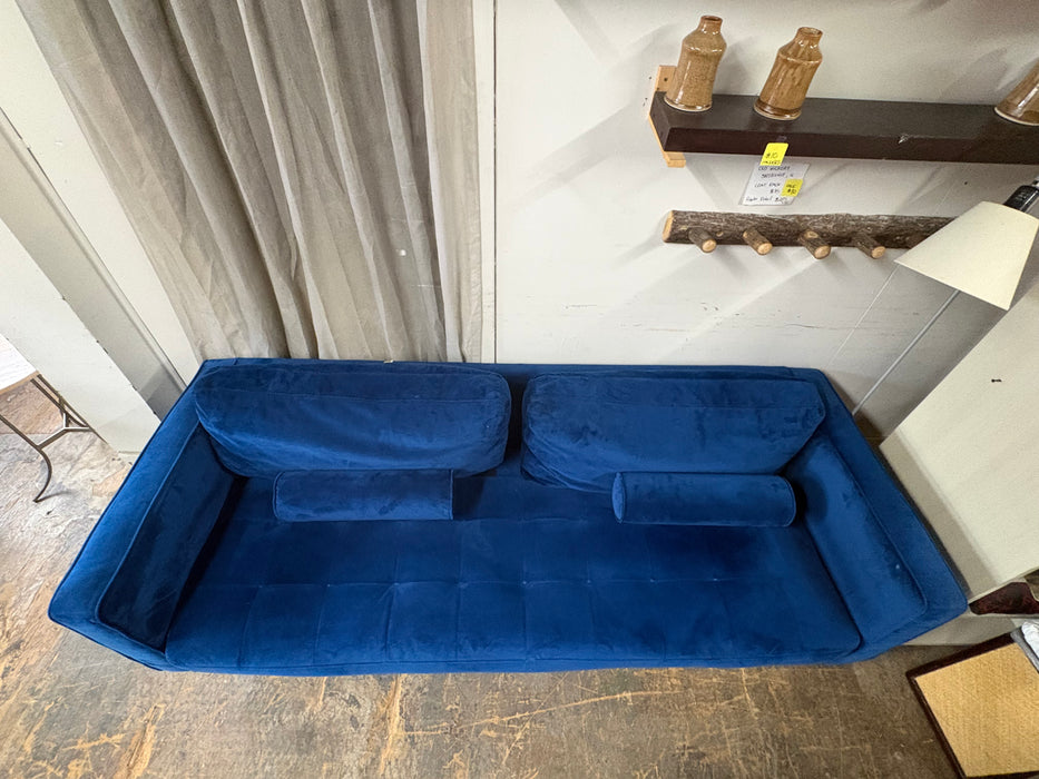 Blue velvet sofa