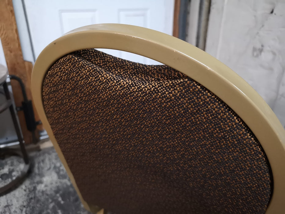Brown upholstered round back Stacking Chair
