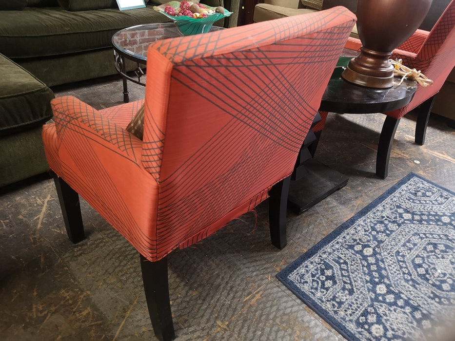 Red with black geo pattern chairs