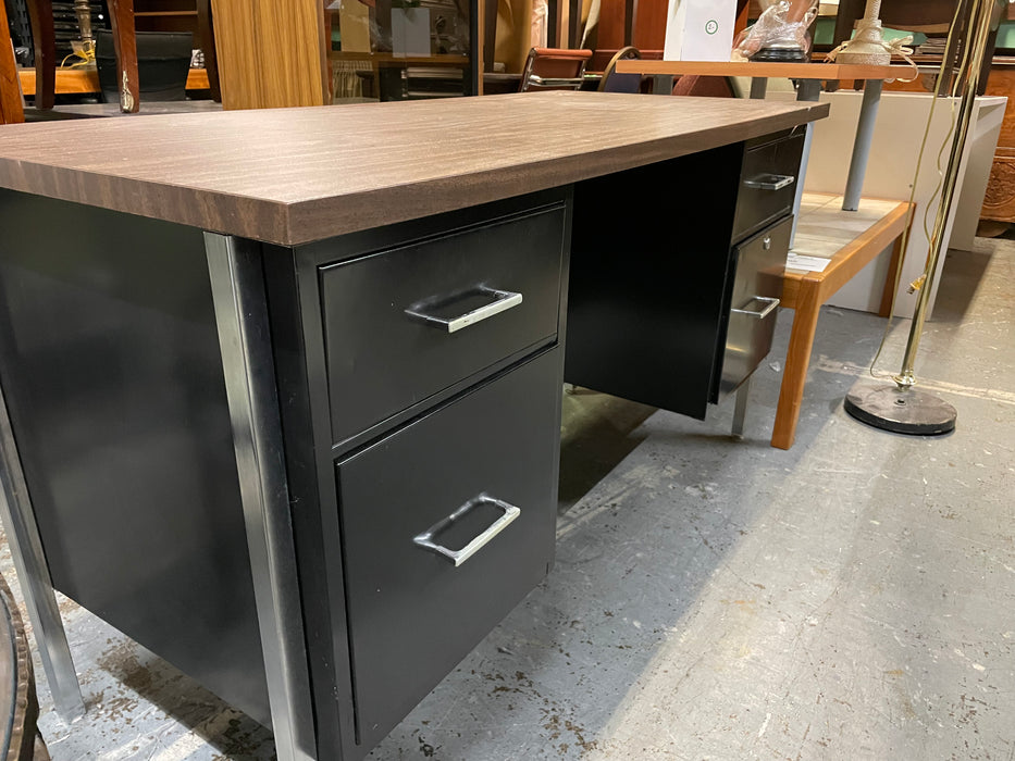 Black metal desk with four drawers