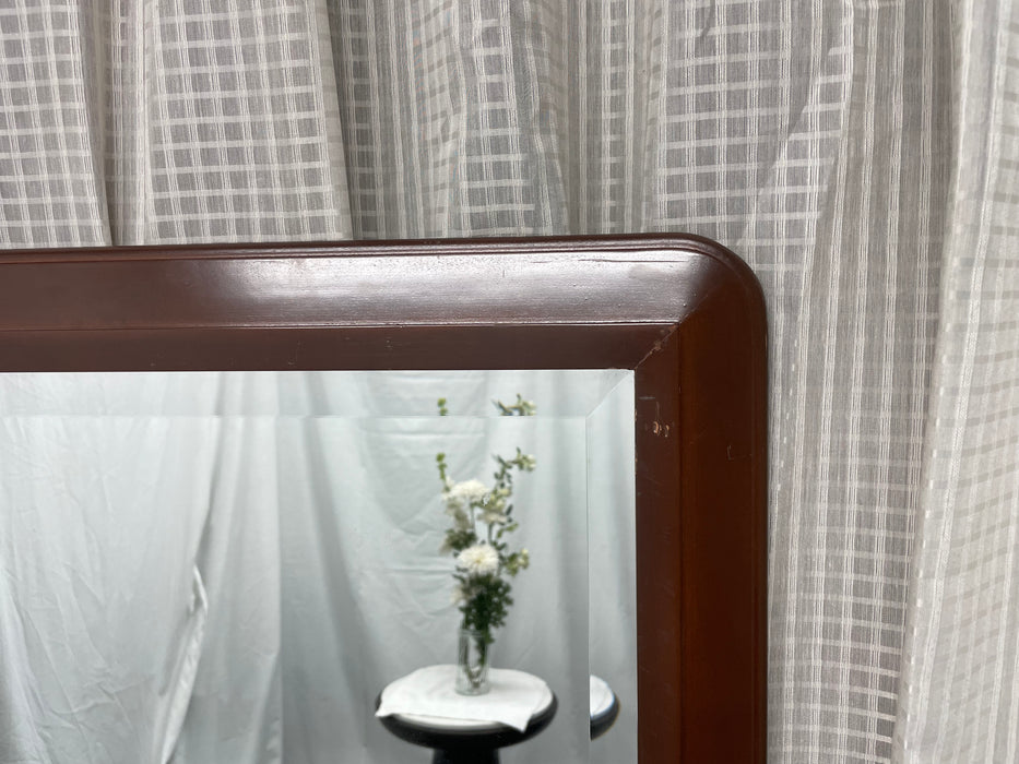 Beveled mirror with wood frame